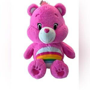 Pink Plush Stuffed Animal with Rainbow Design